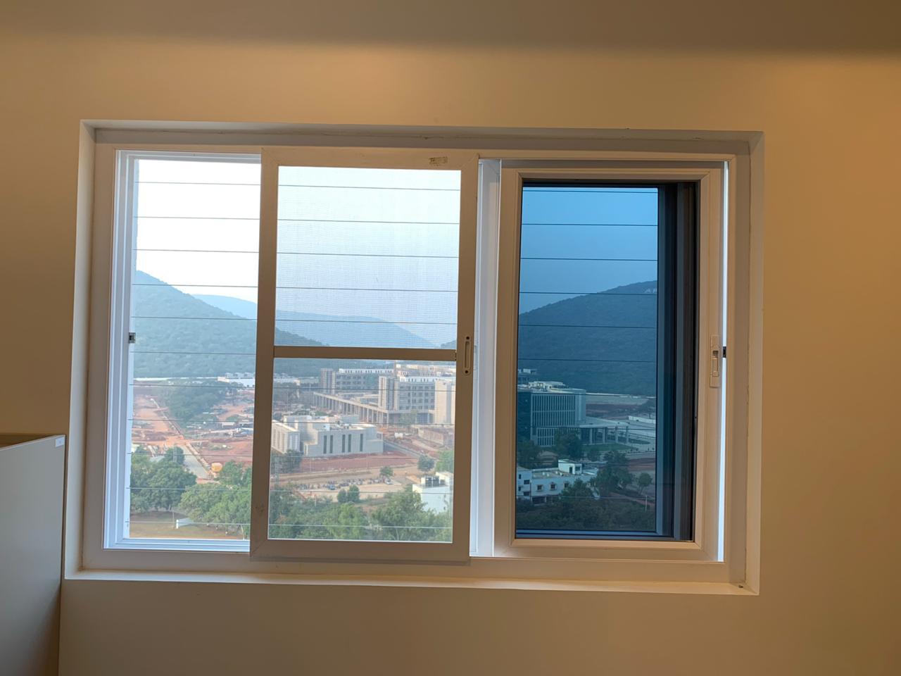 Pro Home Fab — invisible grills installation at sunset